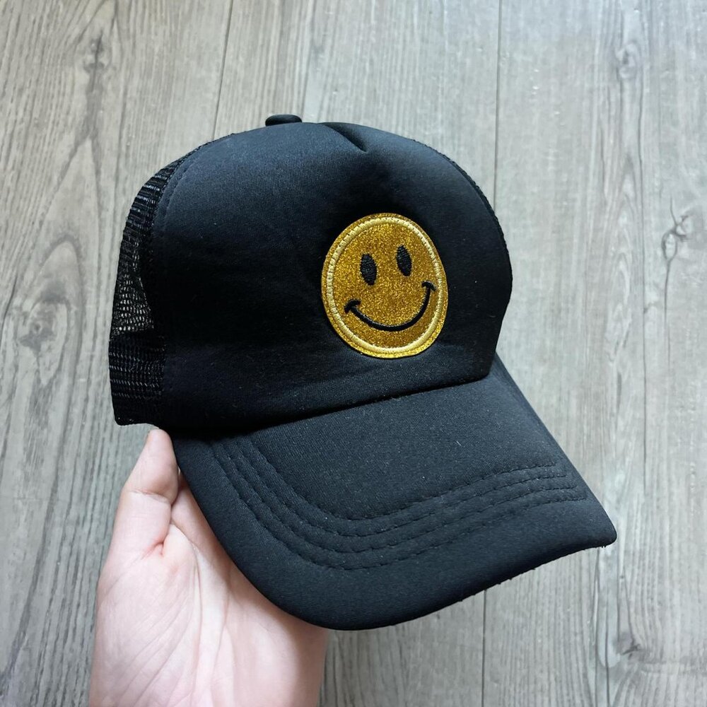 Black trucker hat with sparkly gold smiley face // Excellent condition